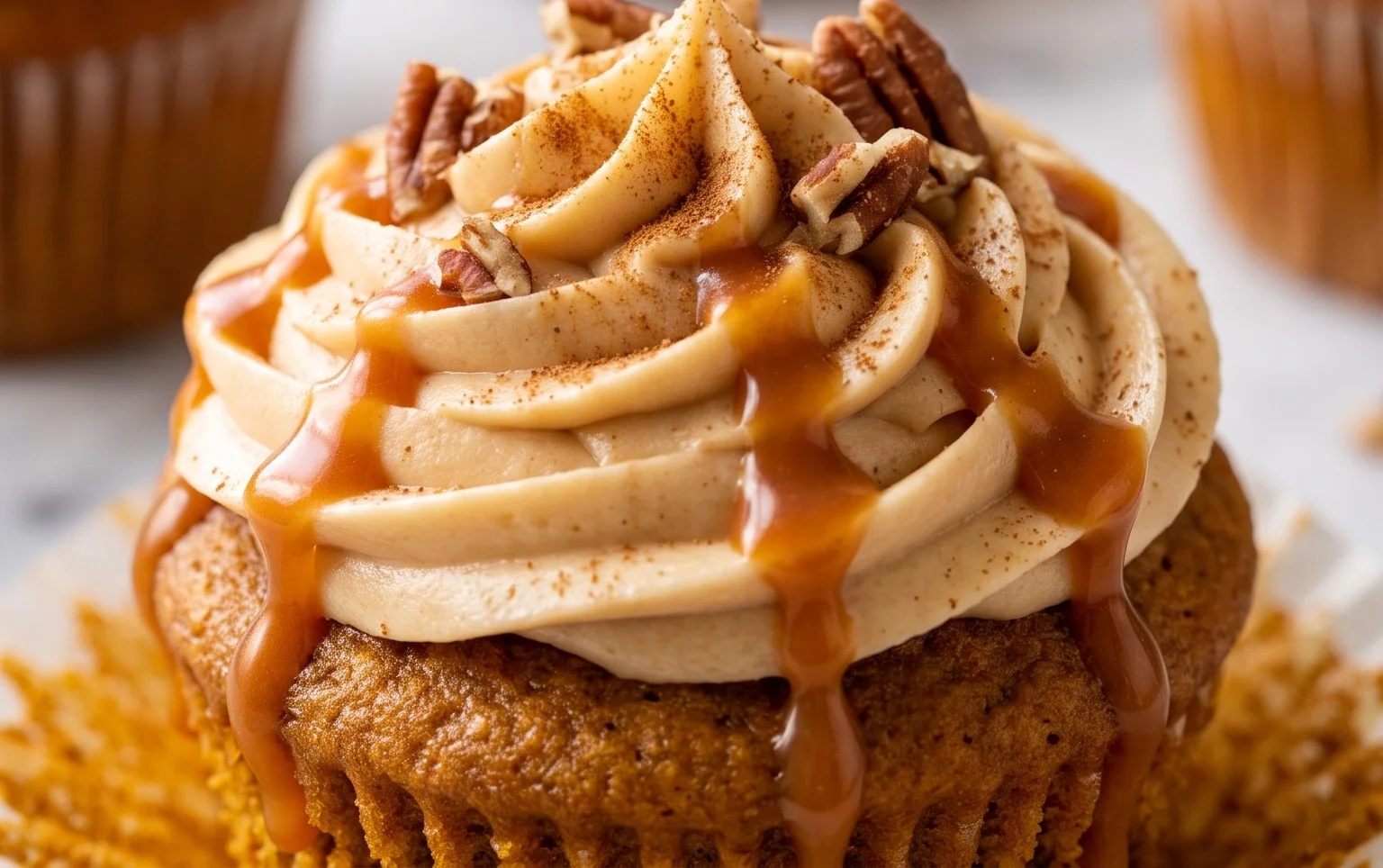 Pumpkin Cupcakes with Caramel Cream Cheese Frosting